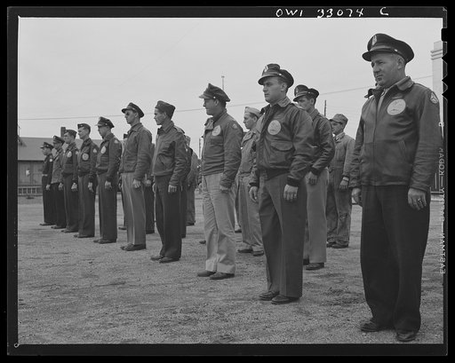 Untitled photo, possibly related to: Bar Harbor, Maine. Civil Air Patrol base headquarters of coastal patrol no. 20. Pilots and observers in marching maneuvers during their daily calisthenics period