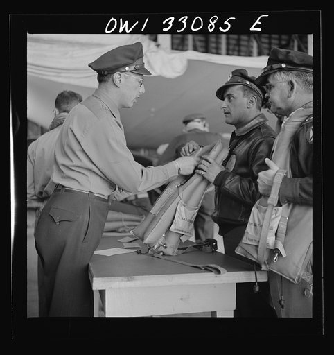 Bar Harbor, Maine. Civil Air Patrol base headquarters of coastal patrol no. 20. Routine check of "Mae West" life preservers