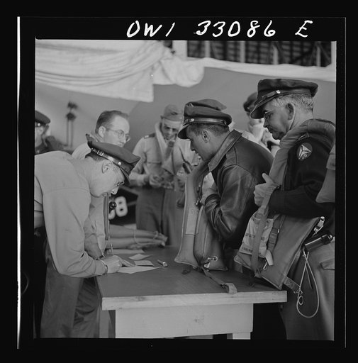 Bar Harbor, Maine. Civil Air Patrol base headquarters of coastal patrol no. 20. Routine check of "Mae West" life preservers
