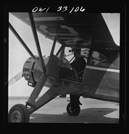 Bar Harbor, Maine. Civil Air Patrol base headquarters of coastal patrol no. 20. The pilot and an observer ready to take off