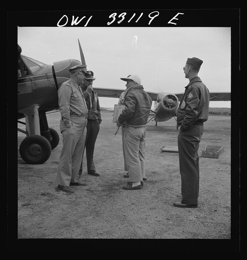 Untitled photo, possibly related to: Bar Harbor, Maine. Civil Air Patrol base headquarters of coastal patrol no. 20. A pilot and an observer after completing a patrol