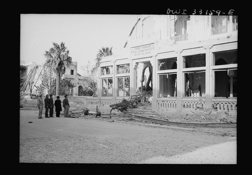 Untitled photo, possibly related to: Sousse, Tunisia. Archbishop Spellman walking with American officers through the streets of Sousse