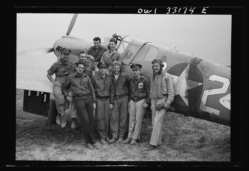 Untitled photo, possibly related to: Members of the 64th Squadron of the 57th Fighter Group, which took part in the aerial victory over the Sicilian straits on April 18, in which seventy-four enemy planes were destroyed