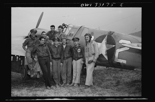 Members of the 64th Squadron of the 57th Fighter Group, which took part in the aerial victory over the Sicilian straits on April 18, in which seventy-four enemy planes were destroyed