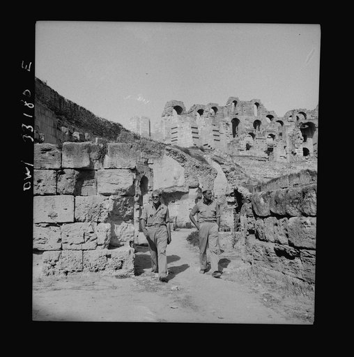 Untitled photo, possibly related to: American troops of the 57th Fighter Group sightseeing among Roman ruins in Tunisia