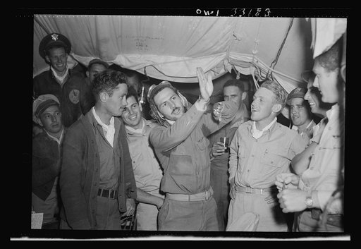 Lieutenant McArthur Powers, twenty-seven, of Inwood, New York, (left) and Lieutenant Richard E. Duffey, twenty-four, of Walled Lake, Michigan, at the 57th Fighter Group base somewhere in Tunisia after both men had become aces in a single engagement by destroying five enemy planes. Powers, who had be