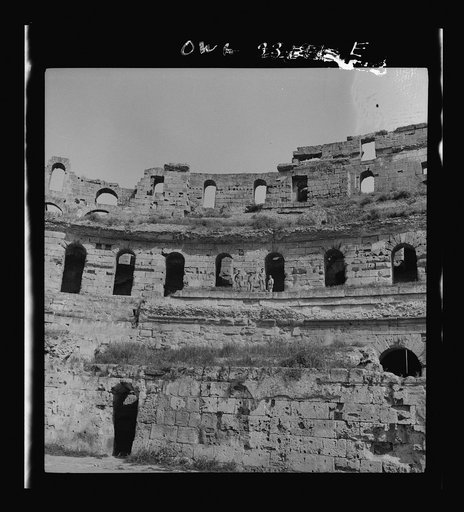 American troops of the 57th Fighter Group sightseeing among Roman ruins in Tunisia