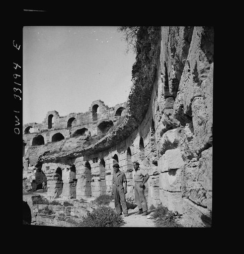 Untitled photo, possibly related to: American troops of the 57th Fighter Group sightseeing among Roman ruins in Tunisia