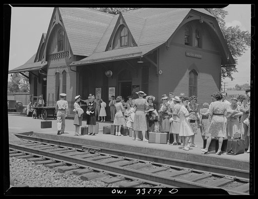 Silver Spring, Maryland. People waiting for a train at the railroad station