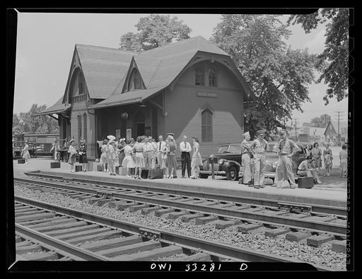 Untitled photo, possibly related to: Silver Spring, Maryland. People waiting for a train at the railroad station