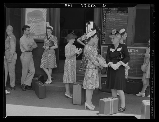 Silver Spring, Maryland. People waiting for a train at the railroad station