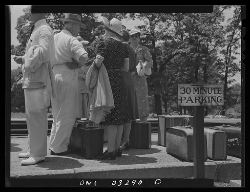 Untitled photo, possibly related to: Silver Spring, Maryland. People waiting for a train at the railroad station