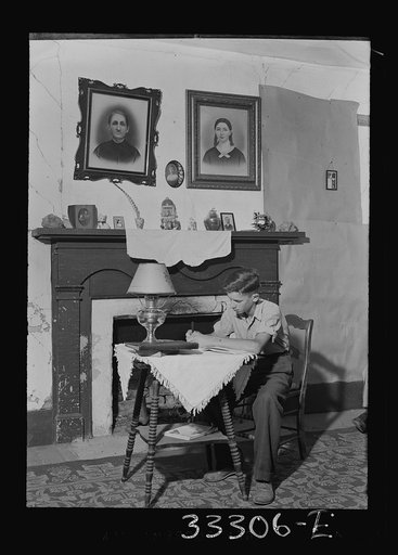Keysville, Virginia. Randolph Henry High School. One of the students studying at home