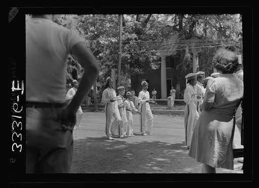 Charlotte Court House, Virginia. Central High School band every month or so marches up Main Street to give drills and concerts. Players must buy instruments and costumes and pay for their own lessons. Lessons are given during school hours