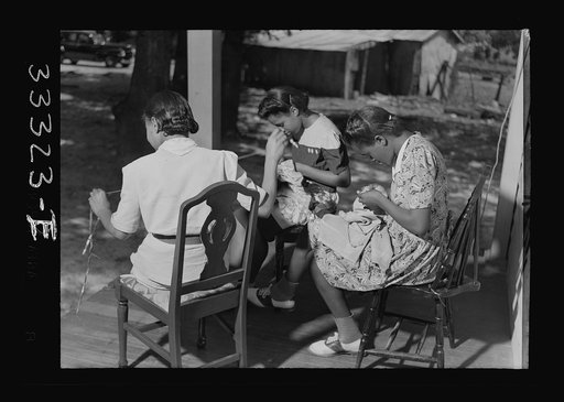 Charlotte Court House, Virginia. Central High School. Sewing on the front porch of home economics cottage