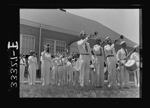 Charlotte Court House, Virginia. Central High School band every month or so marches up Main Street to give drills and concerts. Players must buy their own instruments and costumes and pay for their own lessons. Lessons are given during school hours