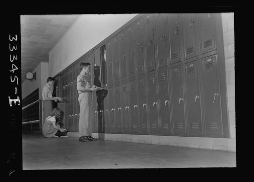 Untitled photo, possibly related to: Keysville, Virginia. Randolph Henry High School. At lockers between classes