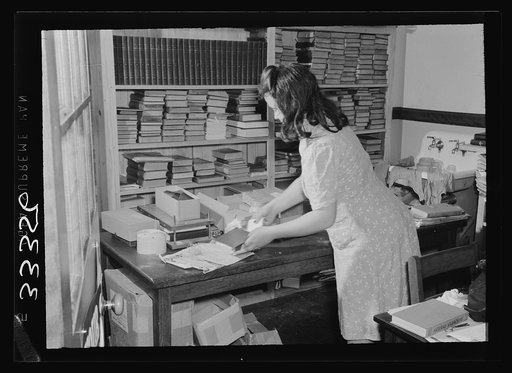 Keysville, Virginia. Repairing library books in preparation for close of school in summer. Randolph Henry High School