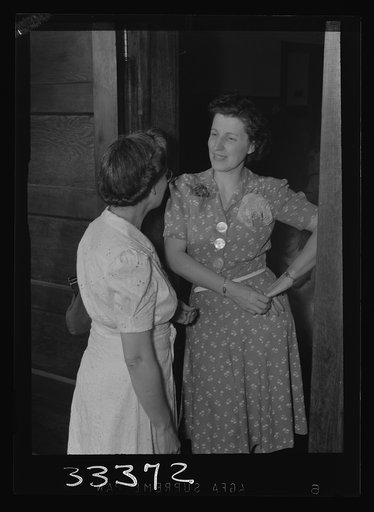 Keysville, Virginia. Randolph Henry High School. Miss Mae Kelly, director of instruction, talking to an elementary school teacher