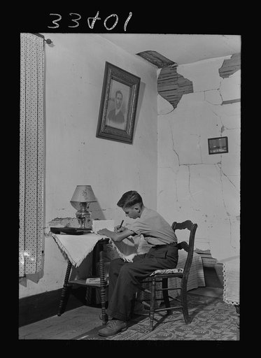 Untitled photo, possibly related to: Keysville, Virginia. Randolph Henry High School. One of the students studying at home