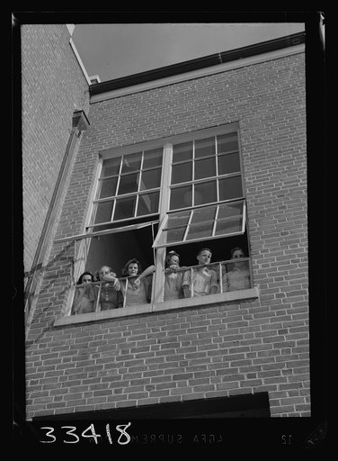 Keysville, Virginia. Randolph Henry High School. Students looking out of window of main building