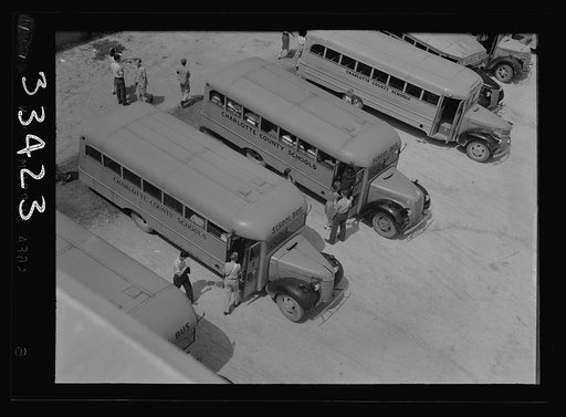 Untitled photo, possibly related to: Keysville, Virginia. Rnadolph Henry High School. Buses bring children from miles around as the school covers an area of 496 square miles. Some children come as many as thirty miles to school in one or the other of the seventeen buses, some of which are driven by 
