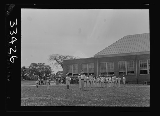 Untitled photo, possibly related to: Charlotte Court House, Virginia. Central High School band every month or so marches up Main Street to give drills and concerts. Players must buy their own instruments and costumes and pay for their own lessons. Lessons are given during school hours