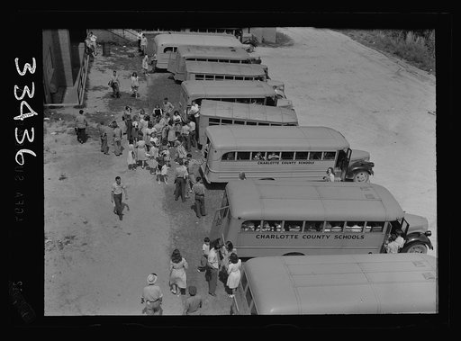Untitled photo, possibly related to: Keysville, Virginia. Randolph Henry High School. Buses bring children from miles around as the school covers an area of 496 square miles. Some children come as many as thirty miles to school in one or the other of the seventeen buses, some of which are driven by 