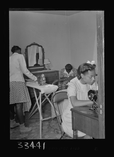Untitled photo, possibly related to: Charlotte Corut House, Virginia. Central High School. Girls in the kitchen of home economics cottage