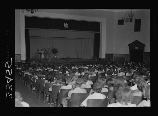 Untitled photo, possibly related to: Charlotte Court House, Virginia. Central High School. A combination gym and auditorium where the seats are movable. The elementary school has no auditorium so the children have come over to pratice an operetta