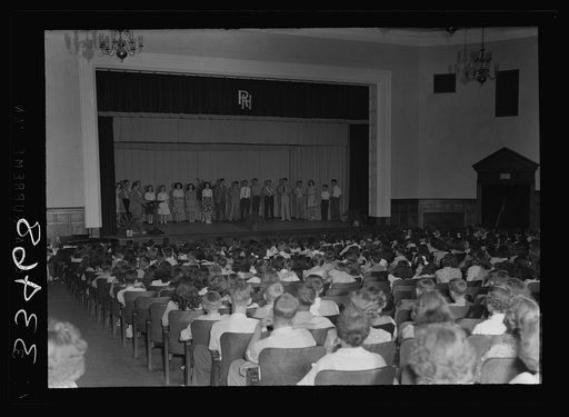 Untitled photo, possibly related to: Charlotte Court House, Virginia. Central High School. Combination gym and auditorium where seats are movable. The elementary school has no auditorium so children have come over to practice an operetta