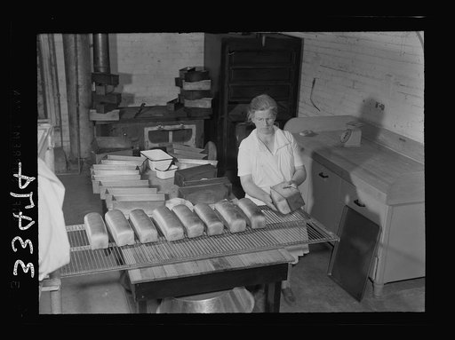 Keysville, Virginia. Baking bread in central bakery; seventy-five loaves each day to be sent to schools via school buses