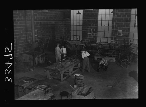 Untitled photo, possibly related to: Keysville, Virginia. Randolph Henry High School. Interior of vocational shop. Boys learn to repair farm machinery, carpentering and welding. Machine shop is a three-year course