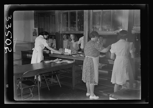 Untitled photo, possibly related to: Keysville, Virginia. Randolph Henry High School. Cafeteria. Students don't have much money so they bring produce from home for which they receive tickets. Lunches cost about fifteen cents. Typical lunch for fifteen cents: candied yams, macaroni and cheese, fruit 