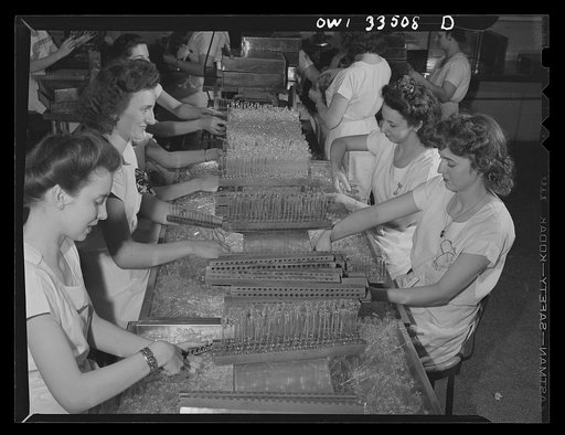 Parke, Davis and Company, manufacturing chemists, Detroit, Michigan. Cutting tips off empty ampoules