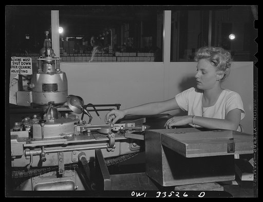 Parke, Davis and Company, manufacturing chemists, Detroit, Michigan. An automatic capping machine