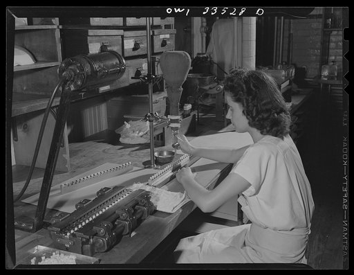 Parke, Davis and Company, manufacturing chemists, Detroit, Michigan. Filling wax capsules with silver nitrate solution