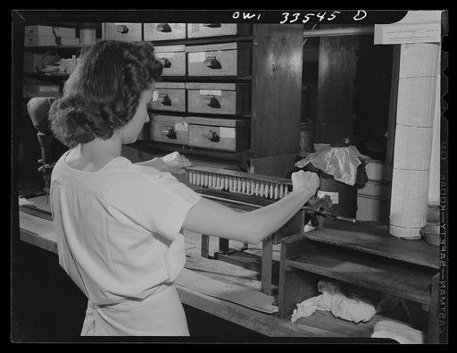 Parke, Davis and Company, manufacturing chemists, Detroit, Michigan. Making wax capsules used for silver nitrate solution
