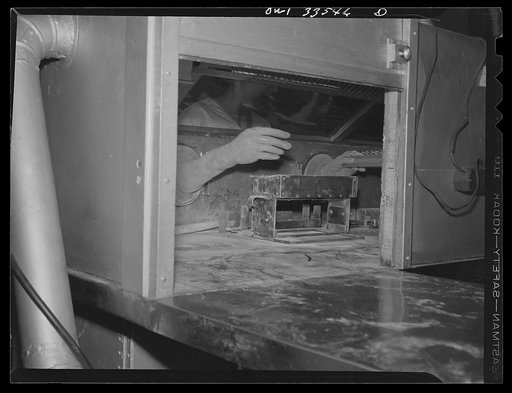 Parke, Davis and Company, manufacturing chemists, Detroit, Michigan. Filling ampoules with an arsenical drug under protected conditions