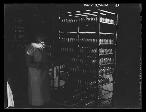 Untitled photo, possibly related to: Parke, Davis and Company, manufacturing chemists, Detroit, Michigan. The manufacture of gelatin caps