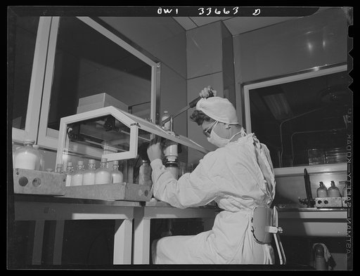 Parke, Davis and Company, manufacturing chemists, Detroit, Michigan. Capping flasks containing blood plasma