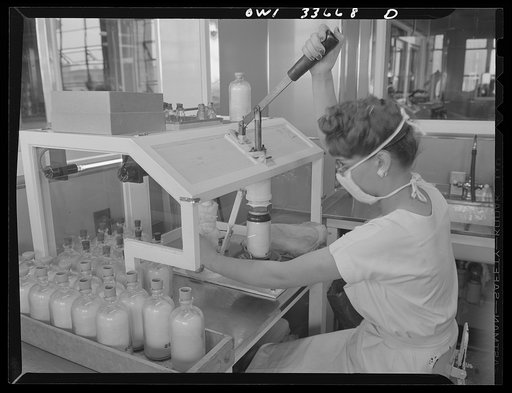 Parke, Davis and Company, manufacturing chemists, Detroit, Michigan. Capping flasks of blood plasma