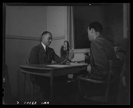 Untitled photo, possibly related to: Schenectady, New York. A school principal giving a news broadcast. The news is broadcast twice a week, each time by a different principal