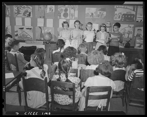 Schenectady, New York. Third graders at the Elmer Avenue Elementary School standing before the class reading their stories, written during the period, on their part in the salvage campaign