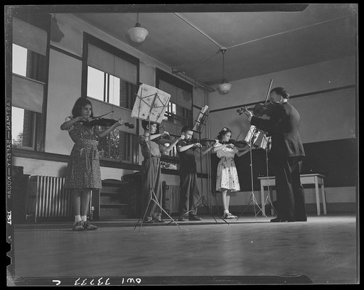 Schenectady, New York. Students from the fourth, fifth, and sixth grades in a music group at the Elmer Avenue Elementary School. Students pay for the loan of instruments and lessons