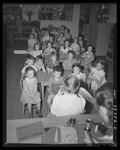 Schenectady, New York. Story reading time in the school library at the Elmer Avenue Elementary School