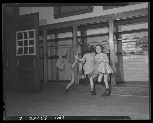 Schenectady, New York. The dash for clothes at the end of the school day at the Elmer Avenue Elementary School