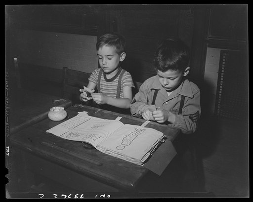 Schenectady, New York. Third grade reading circle at the Elmer Avenue Elementary School. Learning to read by pasting words under pictures
