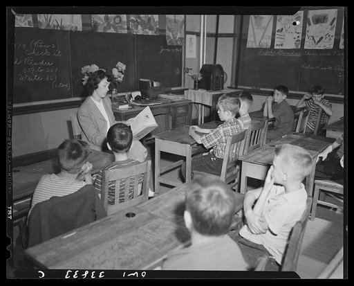 Schenectady, New York. Fourth grade pupils at the Oneida School reading "Heidi," the Swiss childrens' classic. Later the book will be rewritten into a play to be presented to the children of the neighborhood and their parents, the proceeds to go to the American Red Cross