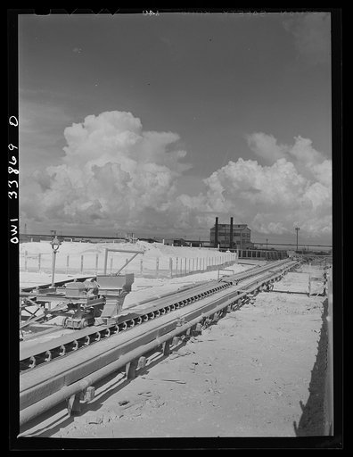 Freeport Sulphur Company, Grand Ecaille, Louisiana. Conveyor belt which carries sulphur from vats to hopper where it is loaded on the barges
